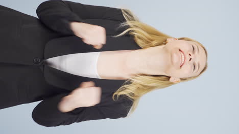 Vertical-video-of-Business-woman-rejoices.